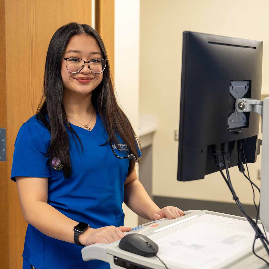 Nursing student Ava Yap in a sample hospital setting.