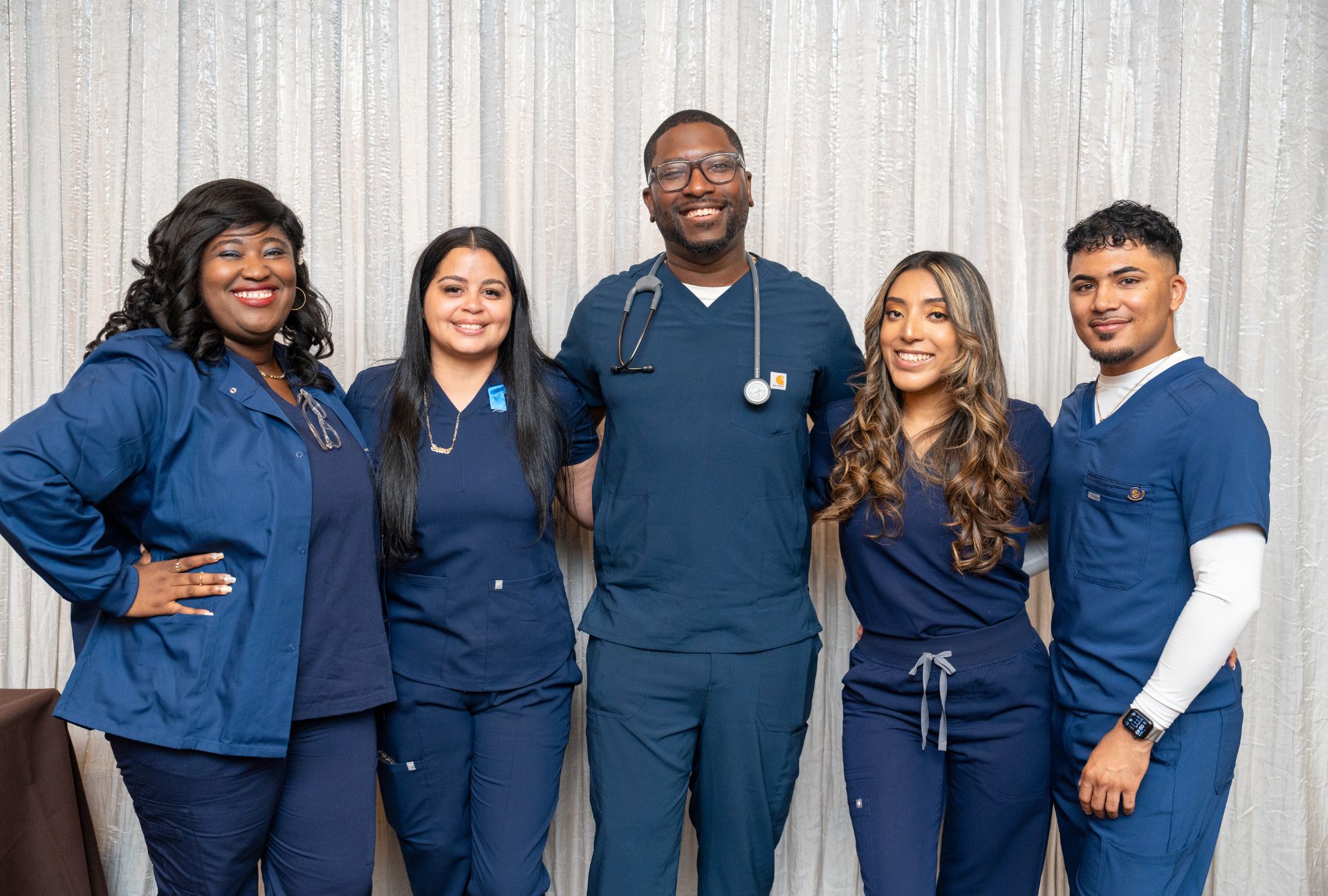 Nursing graduates smiling at the 2025 pinning ceremony