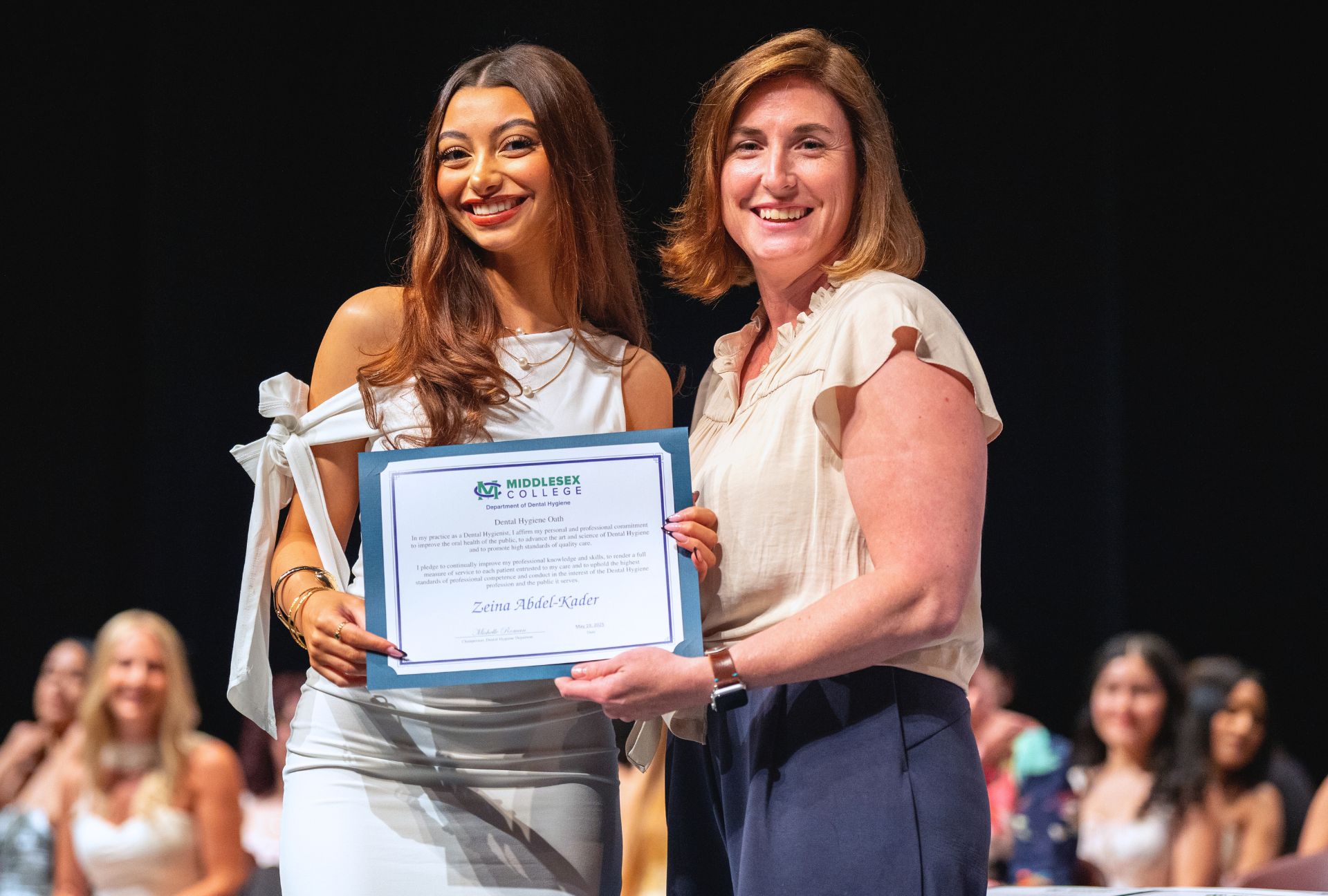 Nadine Thompson with student at the 2025 dental hygienist pinning ceremony