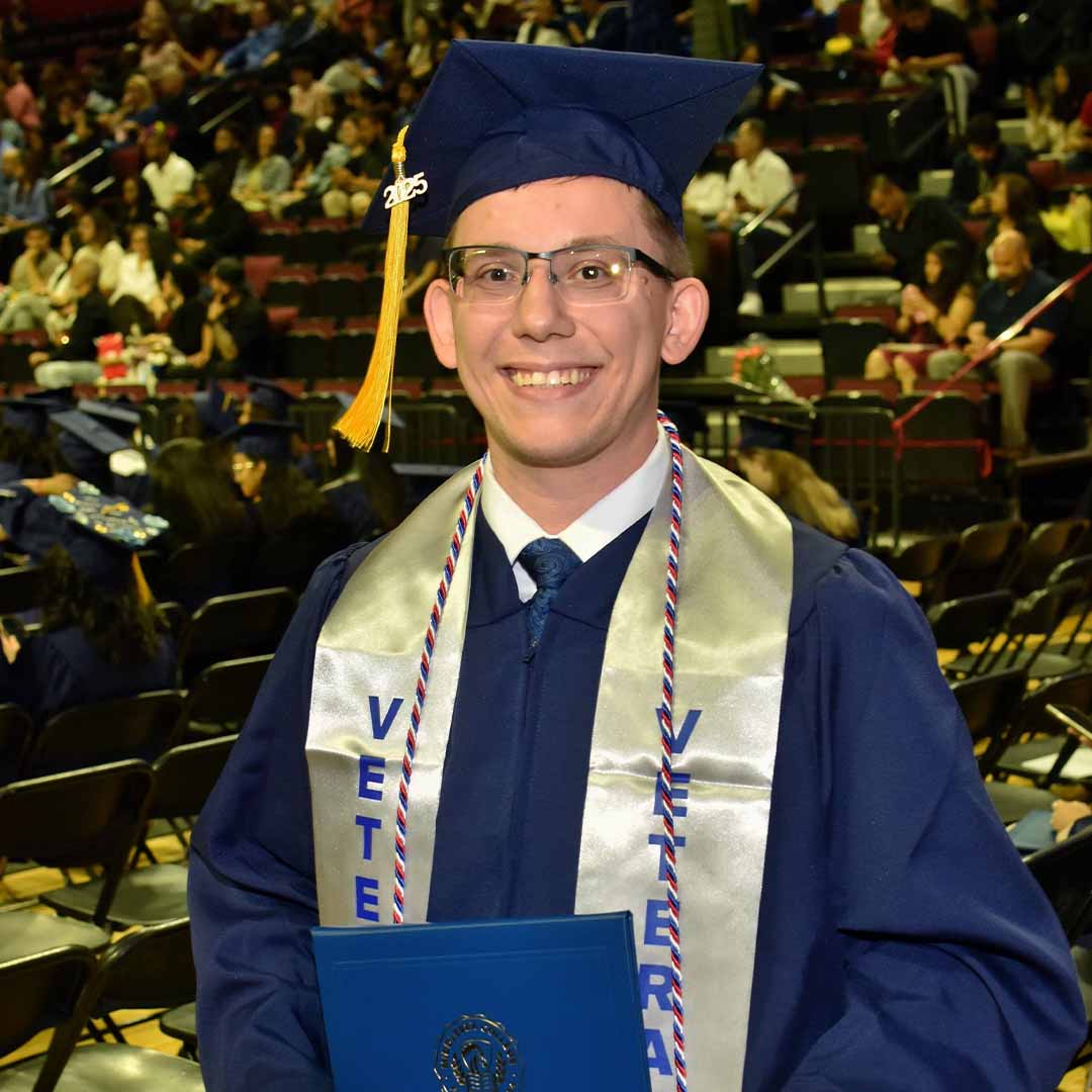 Thomas Lizak, Engineering Technologies major photographed at the 2025 Commencement.